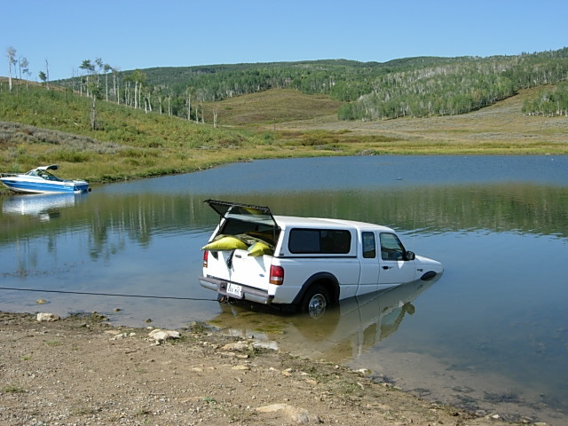 Hooking the truck up to be pulled from the lake